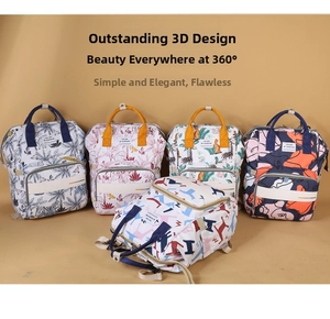 Detail of multi-pattern printed mommy backpacks with multiple zippered compartments and handles