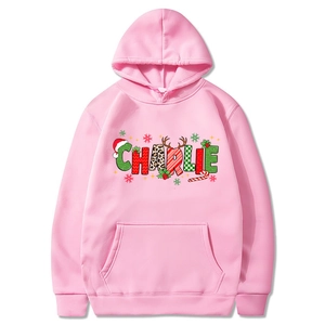 Pink Christmas hoodie with CHARLIE print and festive elements on white background