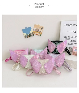 Detail of sequined kids crossbody bags with cute 3D wings in multiple colors