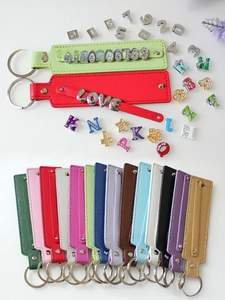 Selection of colorful 8mm PU leather DIY keychains and sliding metal letter accessories
