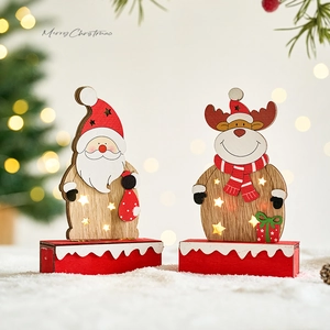 Lighted wooden Christmas Santa and reindeer table ornament with warm LED stars