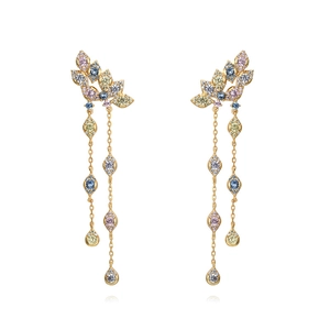 Detailed macro view of S925 tassel earrings with colorful zircons and golden chains