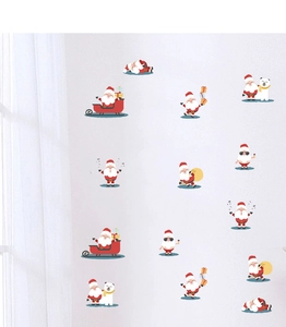 Detail of Christmas tree wall stickers with Santa, polar bear, and gift box cartoon elements