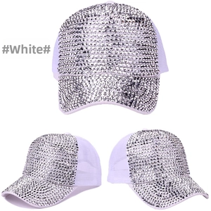 Detail of white baseball cap with shimmering rhinestones and breathable mesh backing