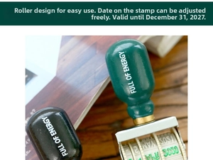 Manual roller date stamp with Full of Energy text on green handle for scrapbooking