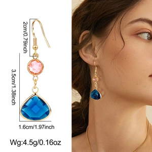 Detailed view of teardrop earrings featuring pink and blue crystals with size dimensions