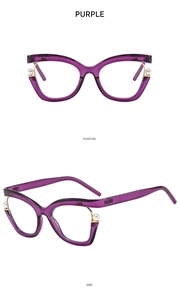 Detail view of purple cat eye frames with elegant pearl accents on side and front