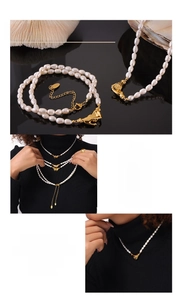 Close-up of 18K gold-plated handshake clasp on a premium pearl bead necklace