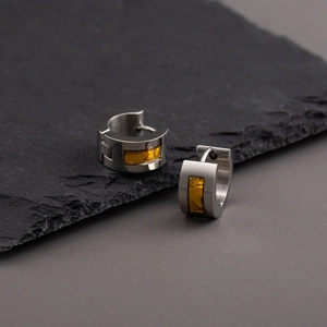 Hip hop titanium steel huggie earrings with yellow resin inlay on dark slate background