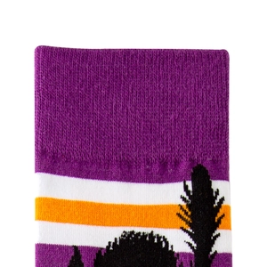 Macro shot of knitted stripes and dark patterns on Halloween-themed mid-calf crew socks