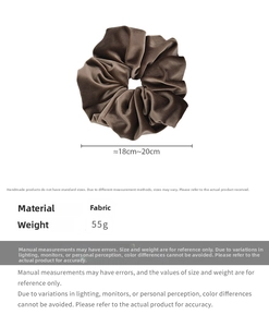 Detail showing oversized brown velvet scrunchie dimensions of 18-20cm and 55g weight