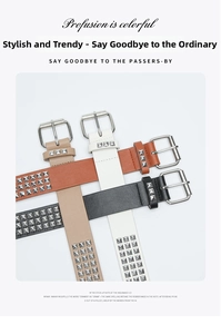 Detail of four multi-color faux leather belts with square silver pyramid metal studs