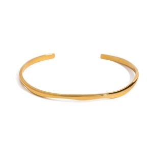 Close-up of minimalist golden stainless steel open bangle with a polished finish