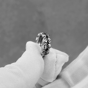 Gothic punk silver skull hoop earrings in stainless steel for a vintage biker style look