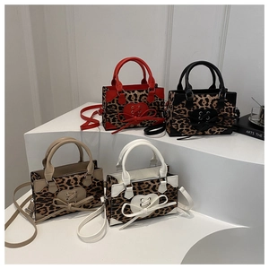 Collection of four leopard print square handbags in red, black, white and khaki variants