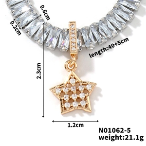 Macro shot of gold star pendant with white zircons, 2.3cm height, 40+5cm chain details