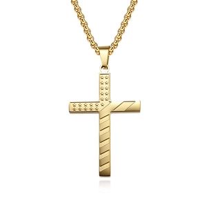 Detailed view of golden stainless steel cross pendant with stars and stripes engraving