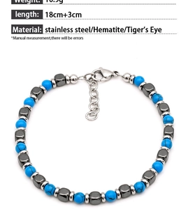 Detail of natural stone bracelet showing hematite beads and stainless steel lobster clasp