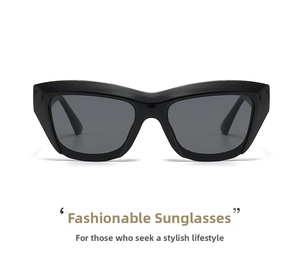 Detail of square semi-rimless sunglasses with bold black frames and dark grey lenses