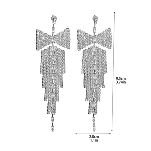 Detailed view of silver butterfly tassel earrings showing length 9.5cm and width 2.8cm