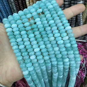 Macro detail of natural light blue amazonite abacus beads for DIY jewelry making