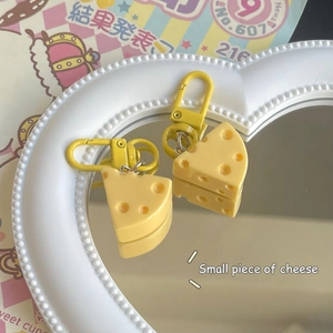 Creative cheese slice keychain with cute yellow realistic swiss cheese and metal clasp