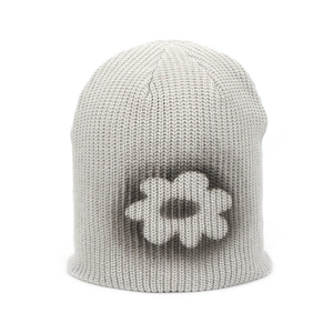 Close-up of grey ribbed knit beanie featuring a street style black hand-painted flower