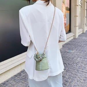 Chic light green crocodile pattern bucket bag with gold chain strap and pleated handle