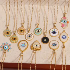 Gold-plated titanium steel necklace set with evil eye and hamsa hand pendants