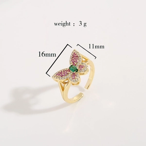 Detailed view of gold butterfly ring with cubic zirconia showing dimensions and weight