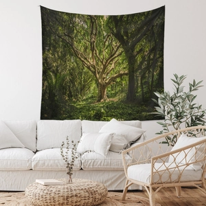 Detailed view of forest wall tapestry with lush green trees in a modern living room