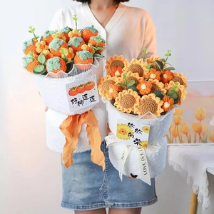 Handmade knitted sunflower and persimmon bouquet in premium white gift wrapping