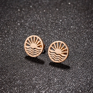 Rose gold stainless steel stud earrings with sunburst and wave pattern engraving
