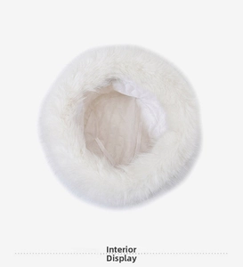 Interior detail of white faux fur bucket hat with quilted lining and adjustable drawstring
