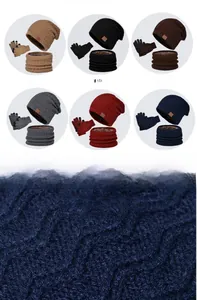 Detailed knit texture and color selection of winter beanie, scarf, and glove set