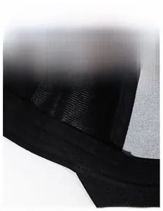 Detail of internal moisture-wicking band on black baseball cap with mesh texture