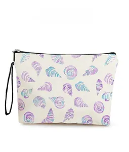 Detail of shell pattern canvas cosmetic bag with black zipper and carry handle