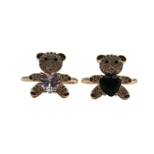 Adjustable golden teddy bear rings with zircon heart detail in black and white styles