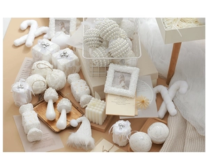 Detailed set of elegant white Christmas tree ornaments with pearls and glittery textures