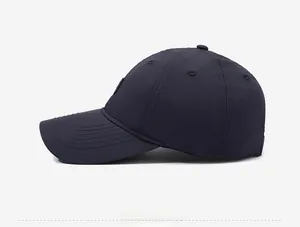 Side view of dark blue breathable quick-dry baseball cap with vent holes