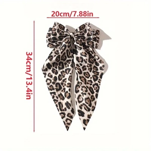 Elegant leopard print bow hair clip with long ribbons in satin finish, 20x34cm size