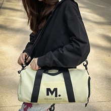 Close-up of durable nylon fabric and large capacity design on this casual crossbody bag