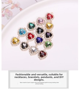 Detailed view of colorful heart-shaped crystal pendants with gold-plated copper frames