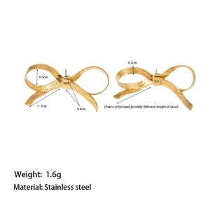 Close-up of golden bow earrings with woven texture details and 2cm width dimensions