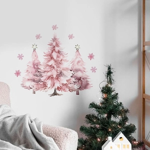 Pink watercolor Christmas tree wall stickers with snowflakes on a white indoor wall
