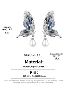 Detailed specs of crystal butterfly drop earrings with pearls and silver pins