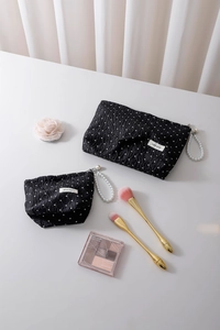 Polka dot travel cosmetic bags with elegant pearl handles in small and large sizes