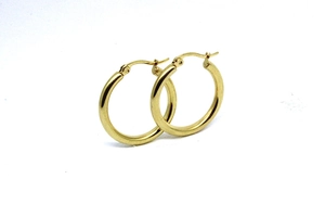 Close-up of classic 3mm thick gold hoop earrings with polished stainless steel finish