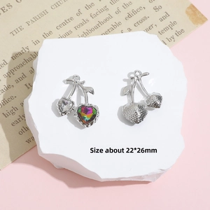 Detailed view of silver cherry pendant charm with zircon inlay for Y2K jewelry DIY