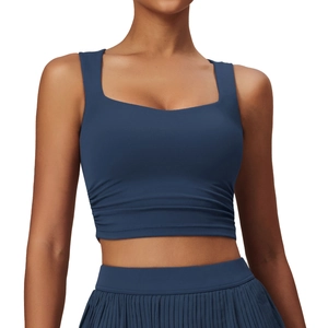 Women's navy blue yoga set with square neck cropped tank top and pleated tennis skirt